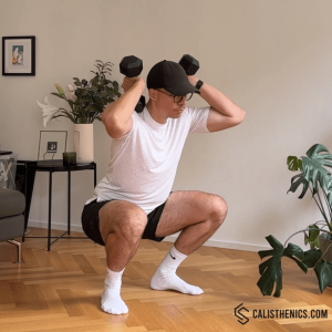 double dubbell back squats bottom position