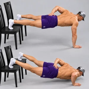 Feet elevated one arm push up