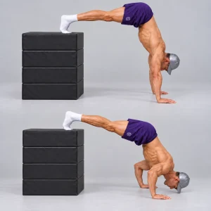 Hip-Height Feet-Elevated Pike Push-Up on plyo boxes